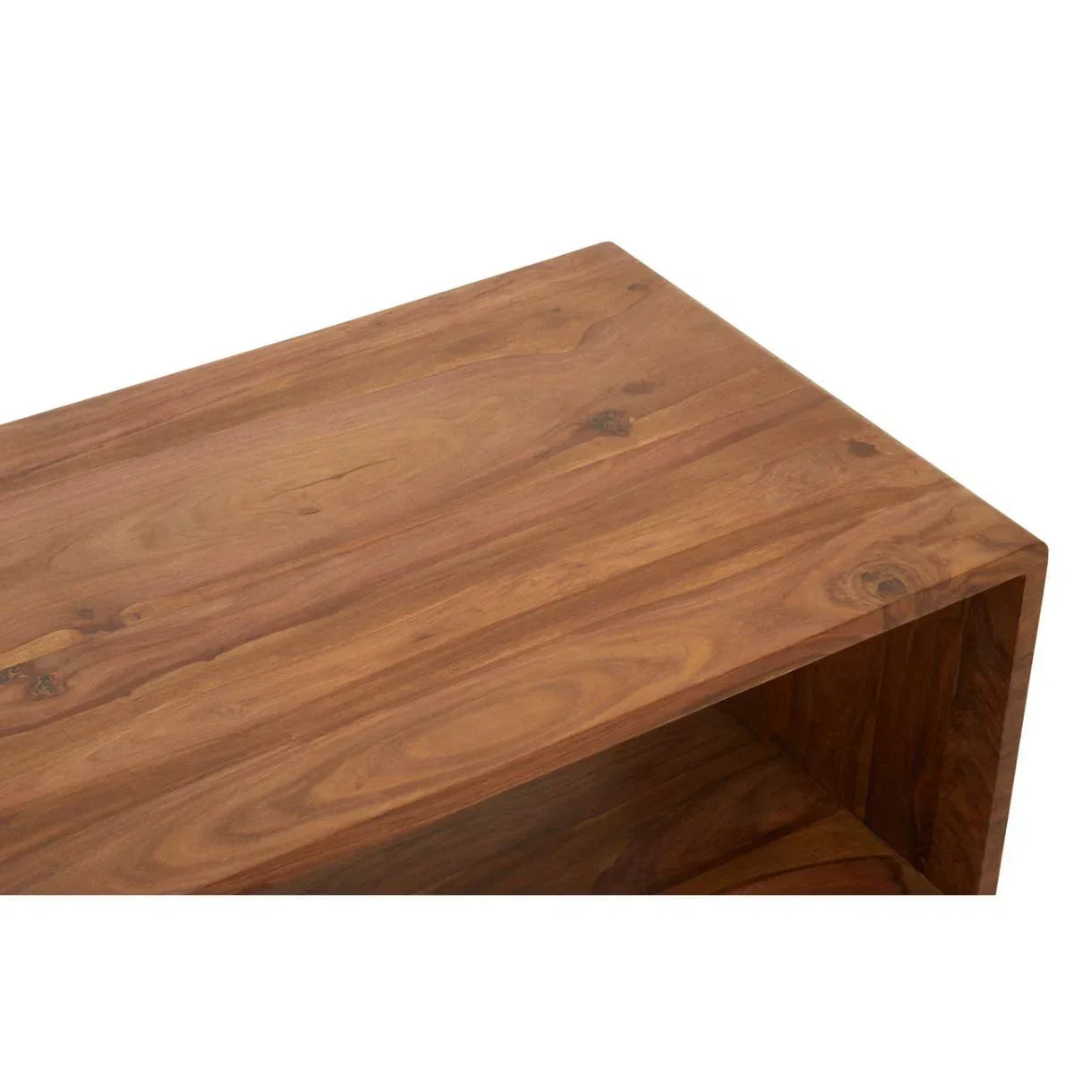 Close-up of wooden coffee table corner showing natural grain pattern and smooth finish
