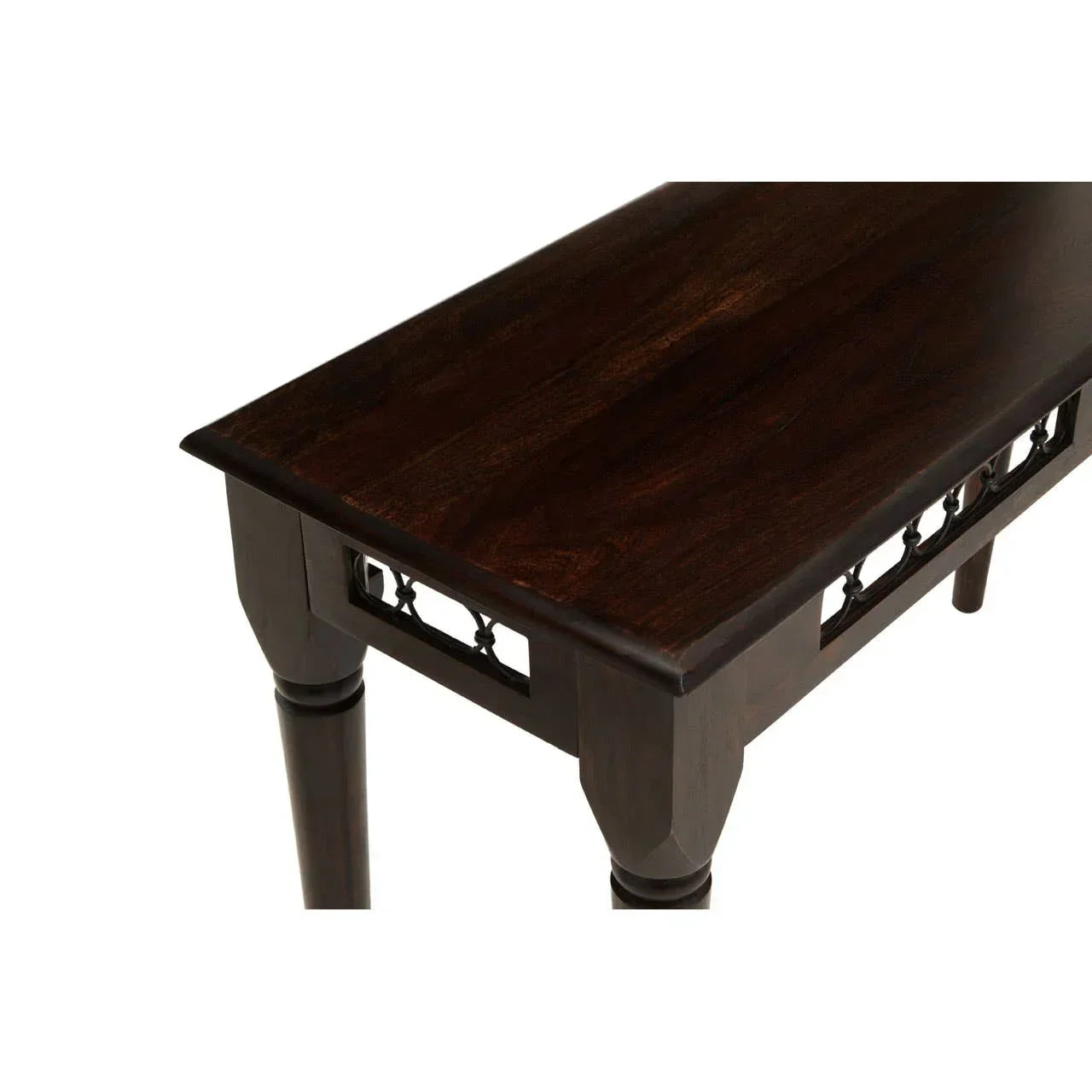 Dark wood console table with turned legs and carved side detail, angled close-up view