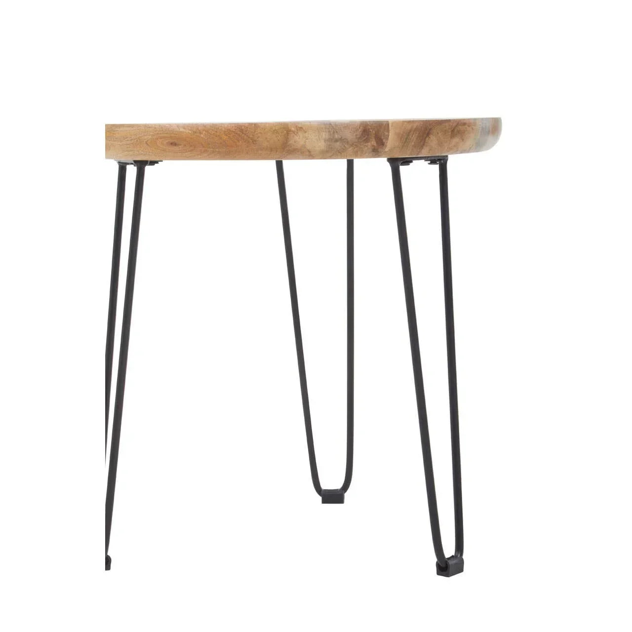 Round wooden table with natural finish and black metal hairpin legs, side angle view