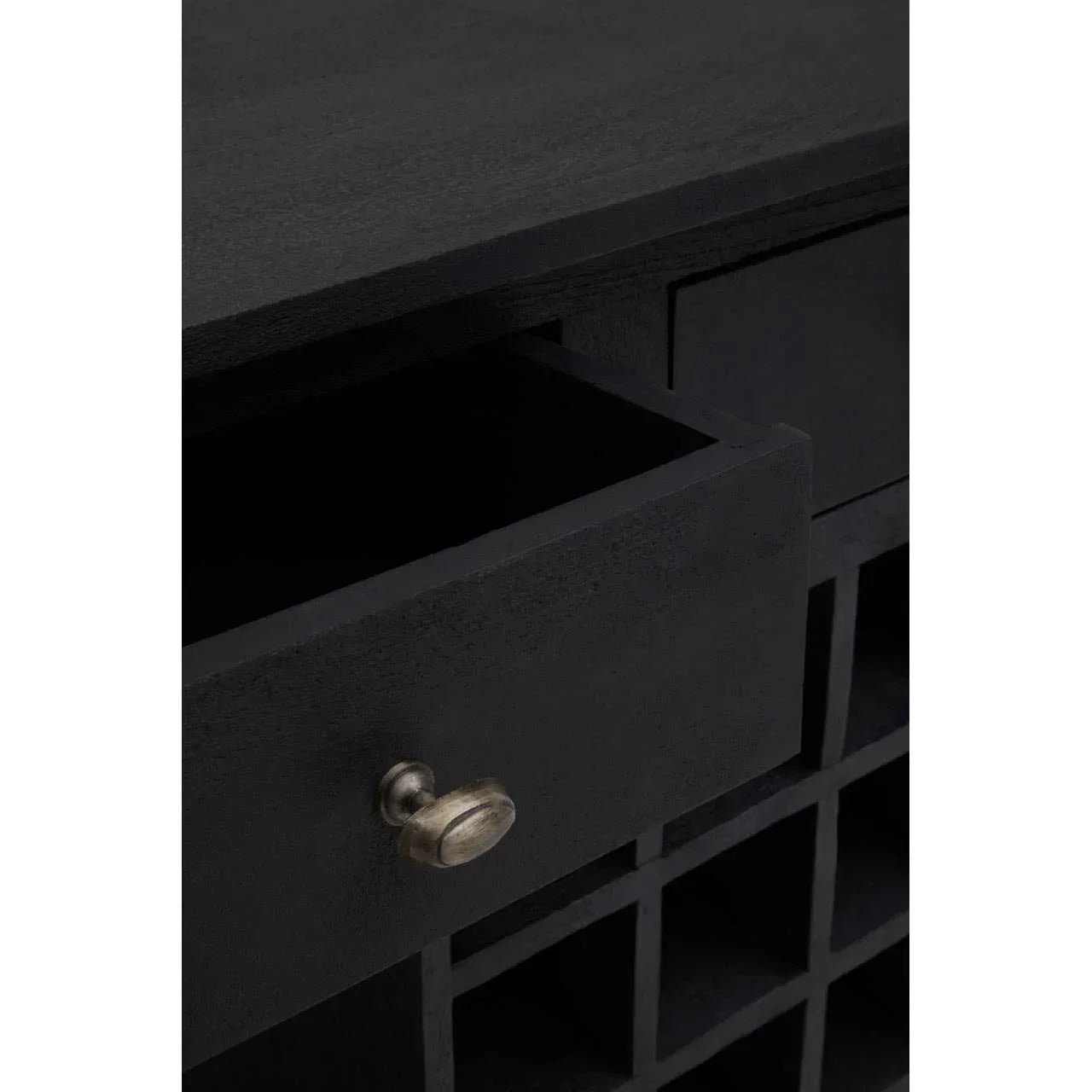 Black wooden sideboard with open drawer and metal handle, grid storage compartments below