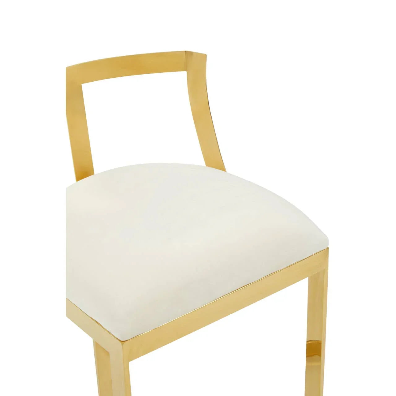 White upholstered dining chair with gold metal frame and minimalist backrest