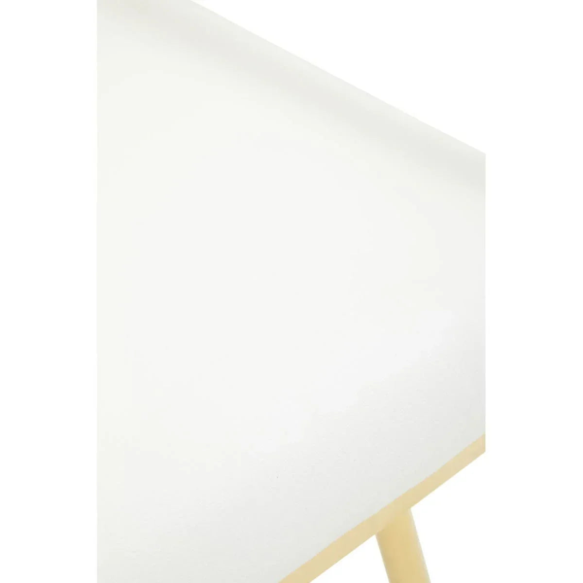 Close detail of white wooden table corner with beige legs and smooth surface