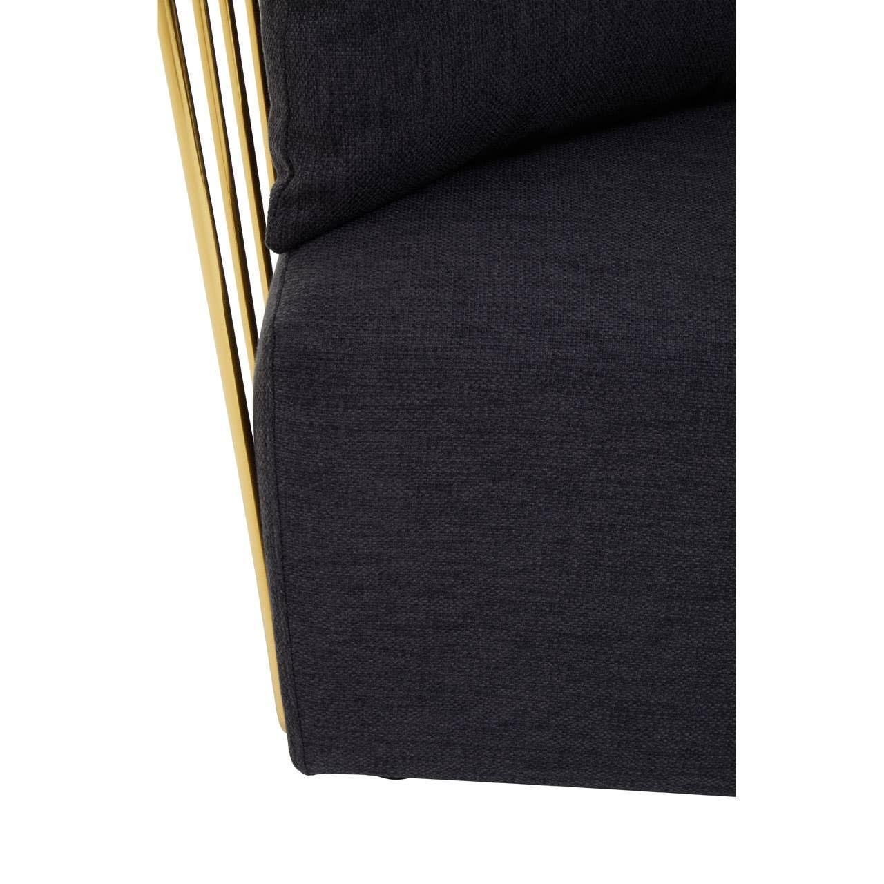 Close detail of dark fabric sofa seat with gold metal frame