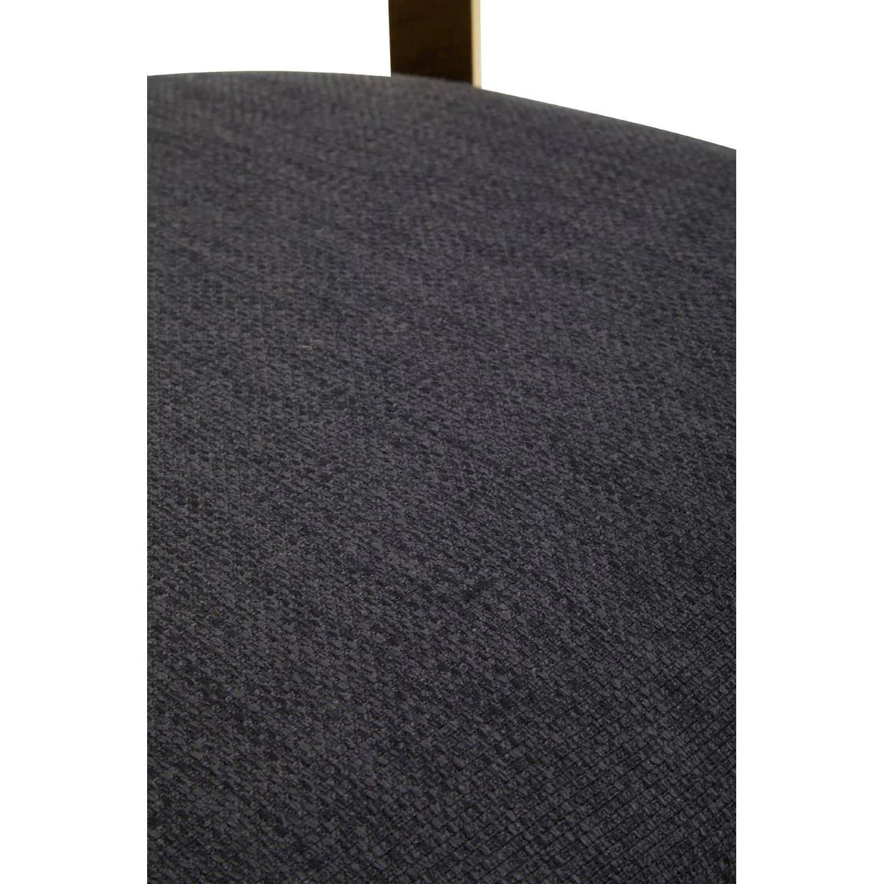Close-up of dark grey upholstered dining chair seat fabric texture