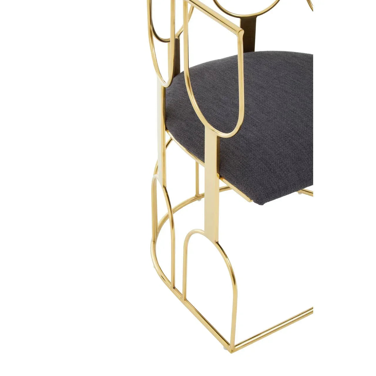 Gold metal chair frame with curved design and charcoal grey fabric seat cushion