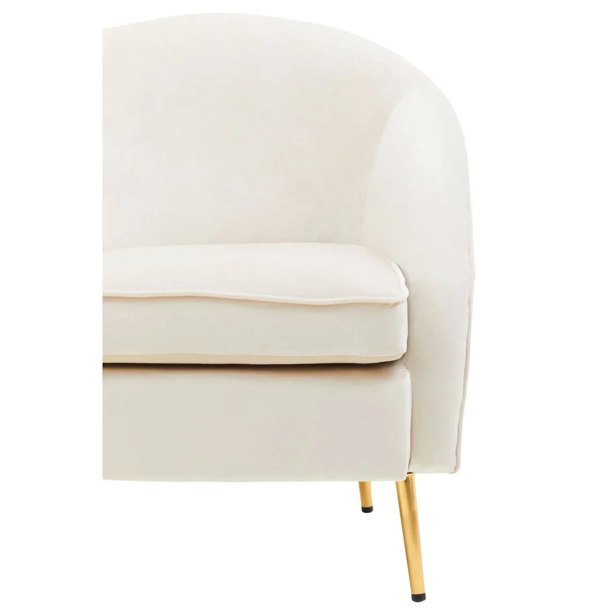 Cream fabric armchair with curved backrest and slim gold metal legs, front side view