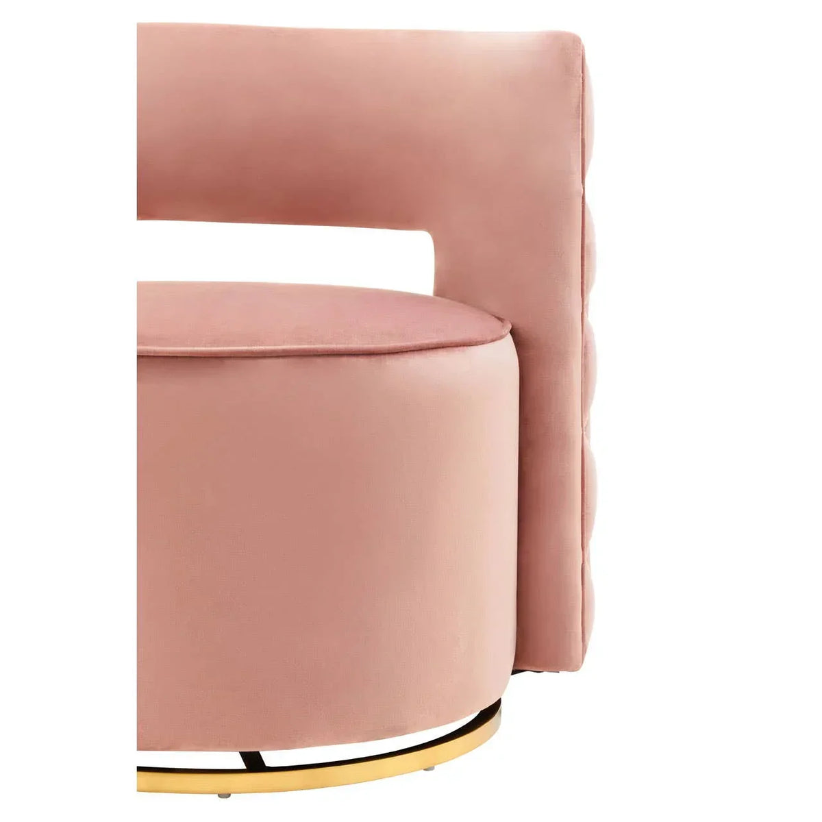 Blush pink velvet accent chair with curved back and gold metal base, close-up view