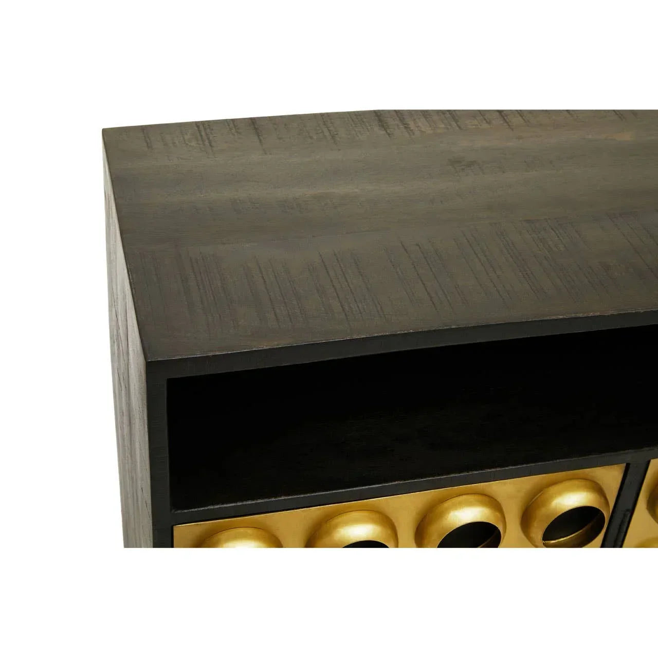 Closeup of wooden sideboard with gold circular drawer fronts