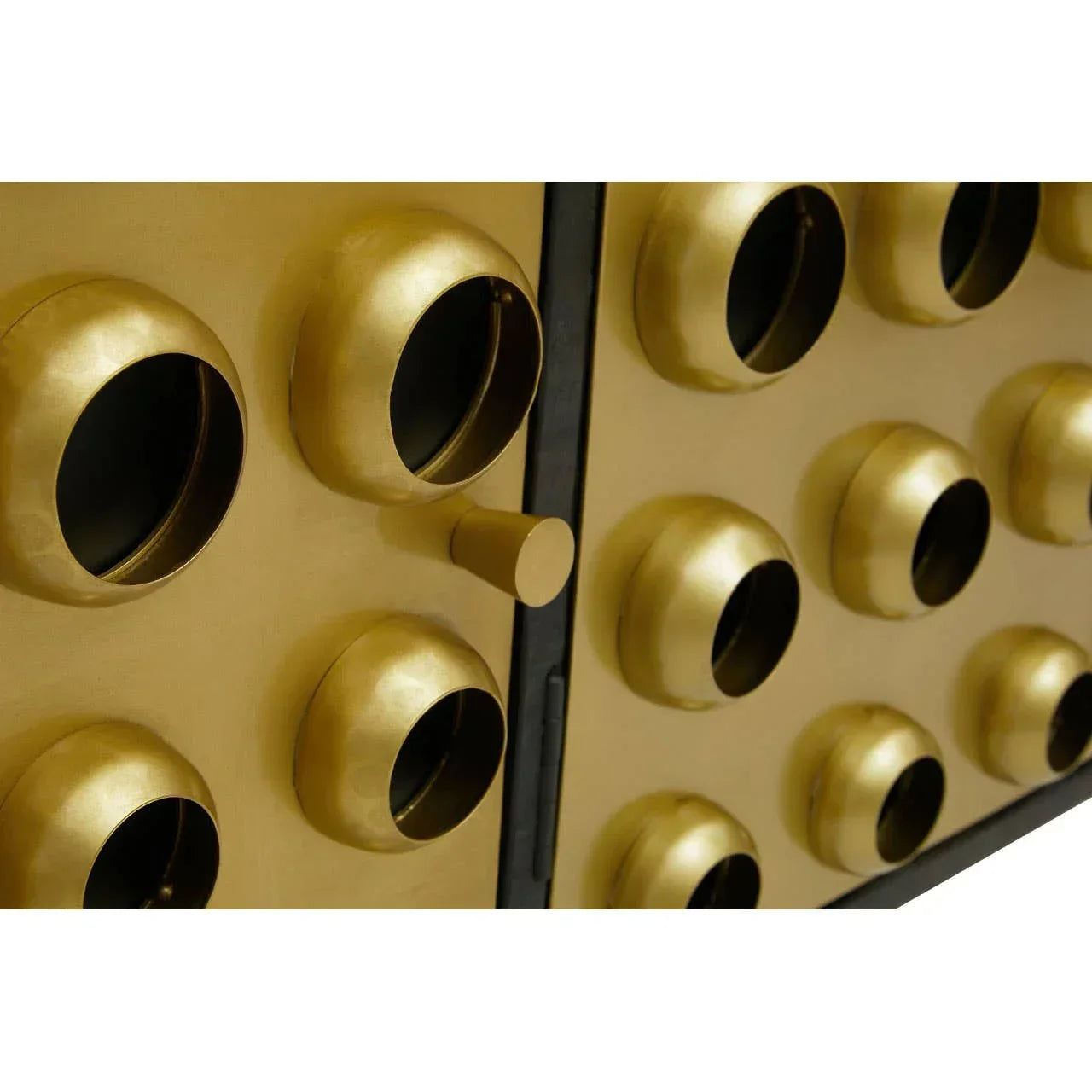 Gold metal sideboard with circular embossed pattern and front view of handle detail