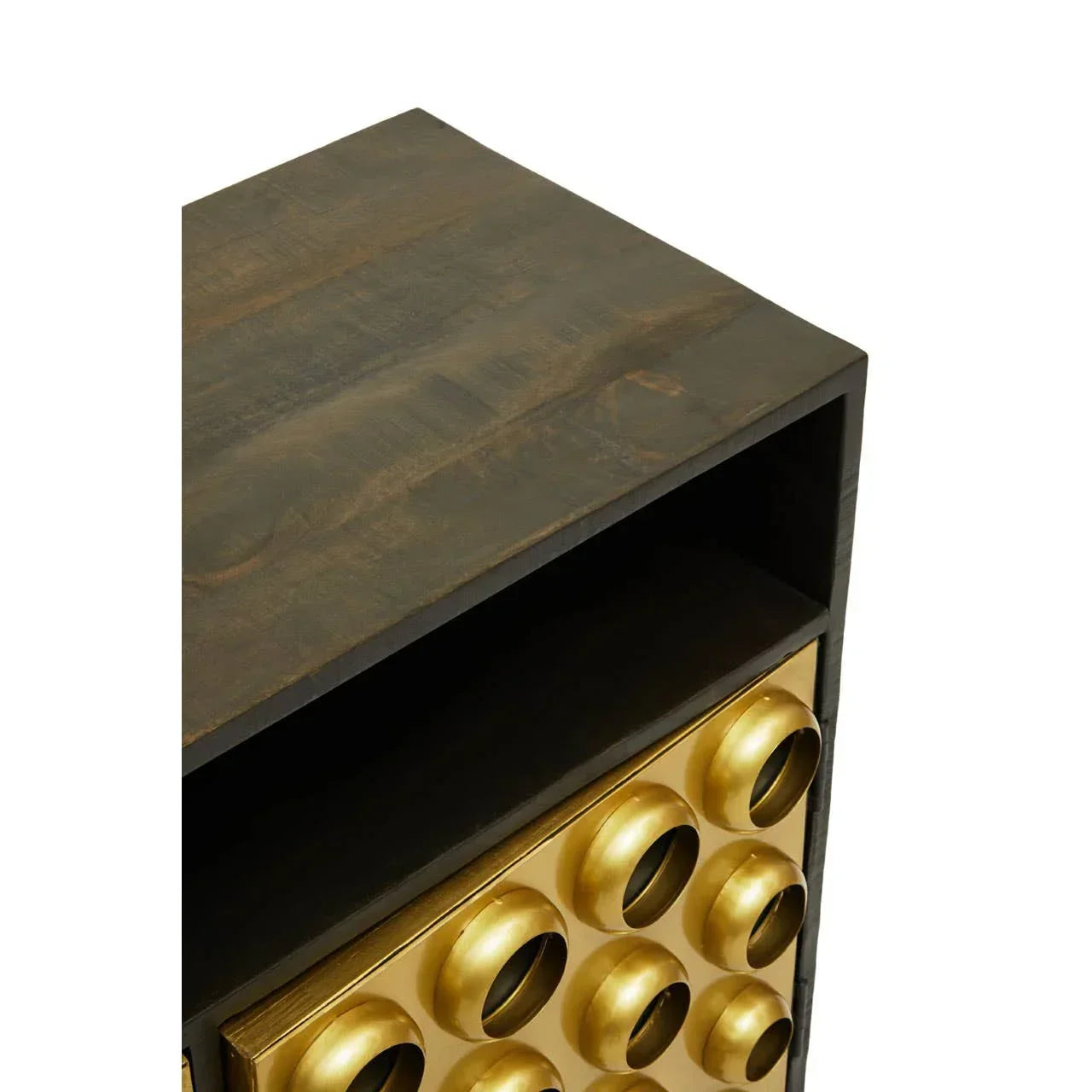 Wooden cabinet with gold textured drawer front and open shelf, close-up corner view