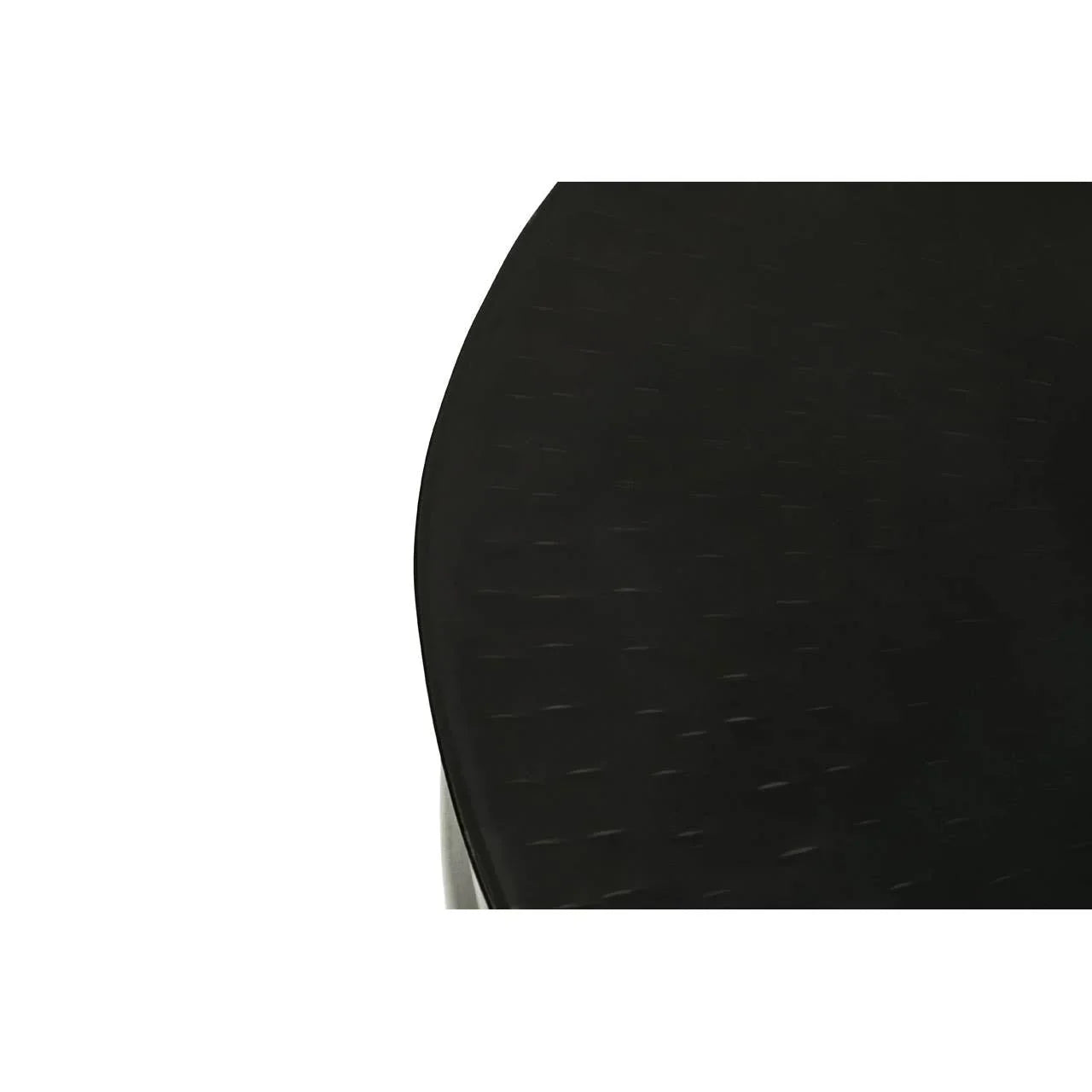 Black round tabletop close-up with subtle textured surface