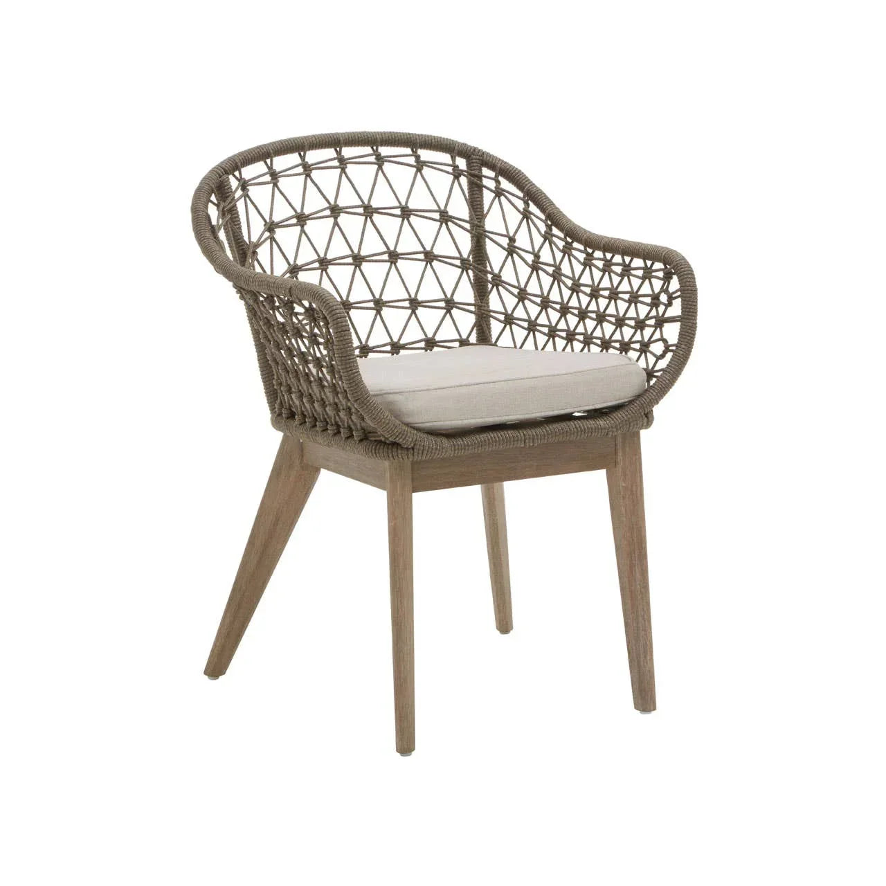 Rattan dining chair with woven backrest, wooden legs and cream seat cushion on white background