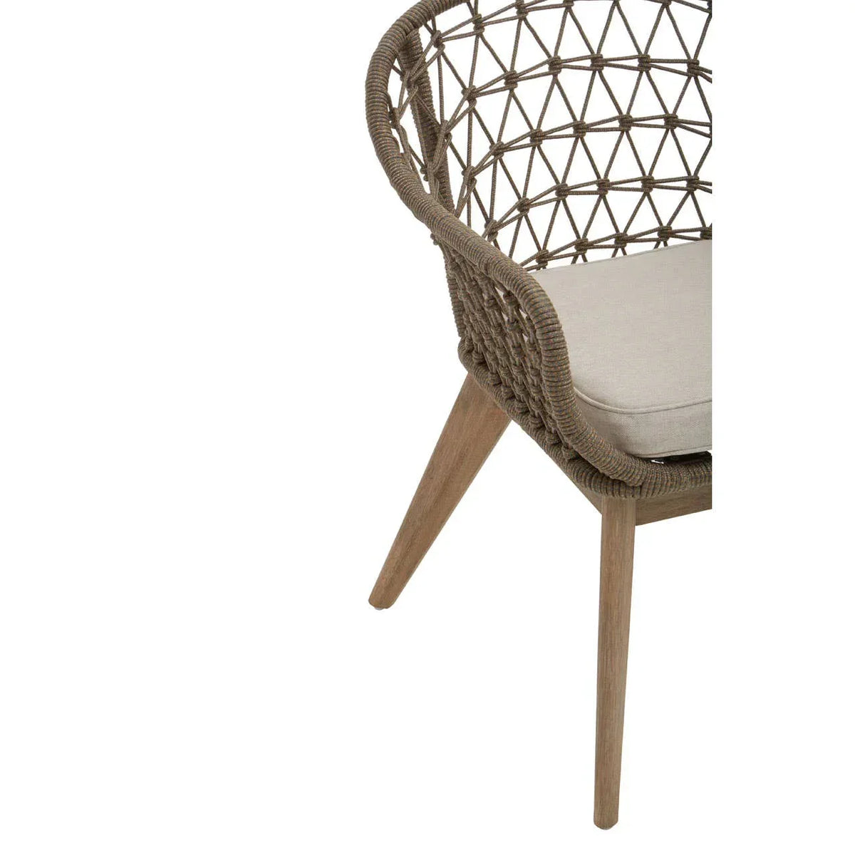Rattan dining chair with beige seat cushion and wooden legs, close-up of side detail