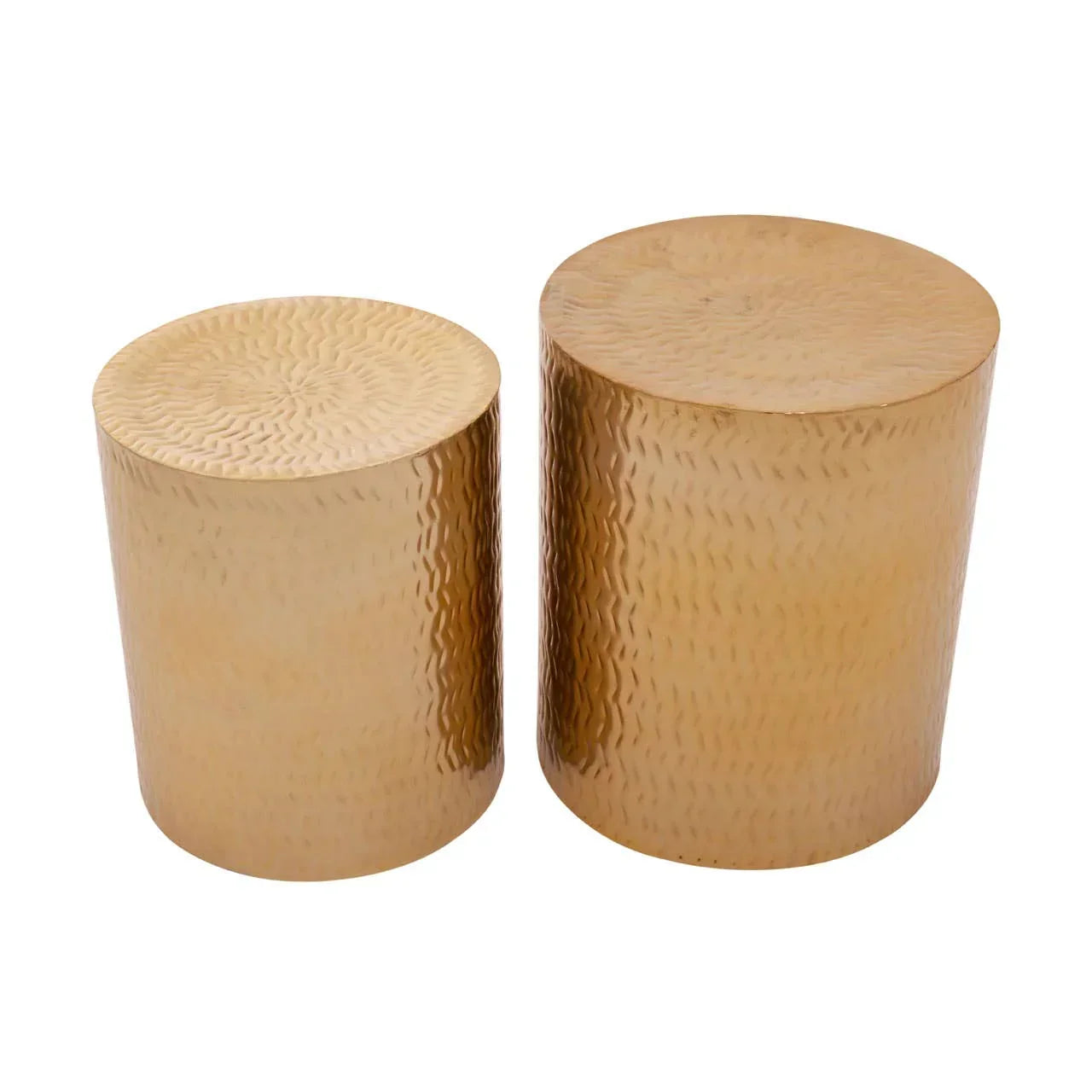 Pair of gold hammered metal side tables with cylindrical shape on white background