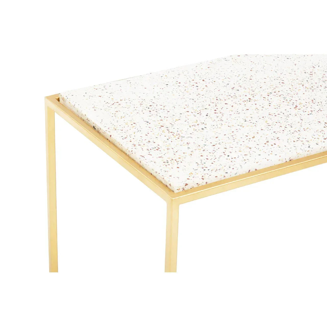 Terrazzo coffee table with gold metal frame and speckled white tabletop close-up