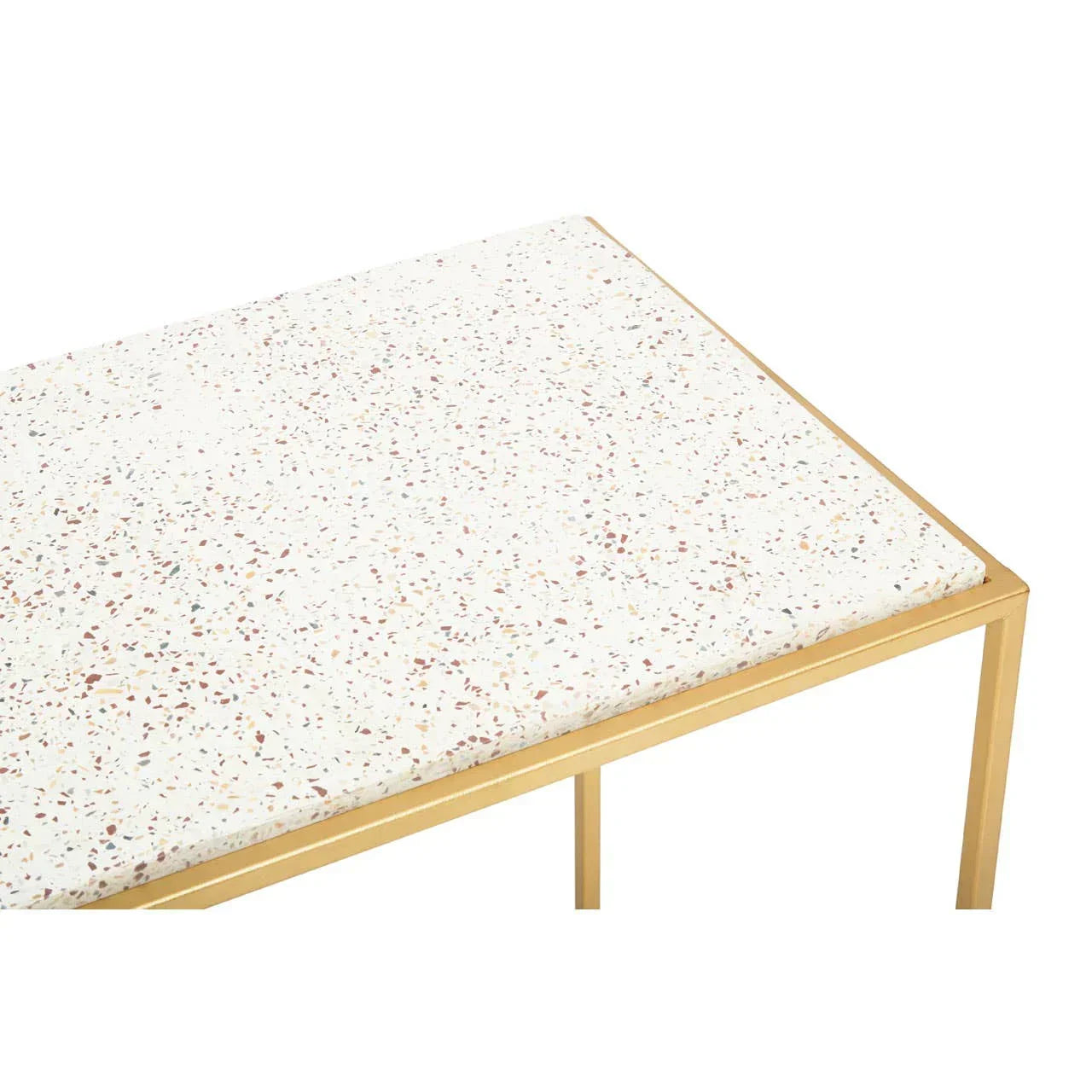 Terrazzo side table with white speckled top and gold metal frame, corner detail view