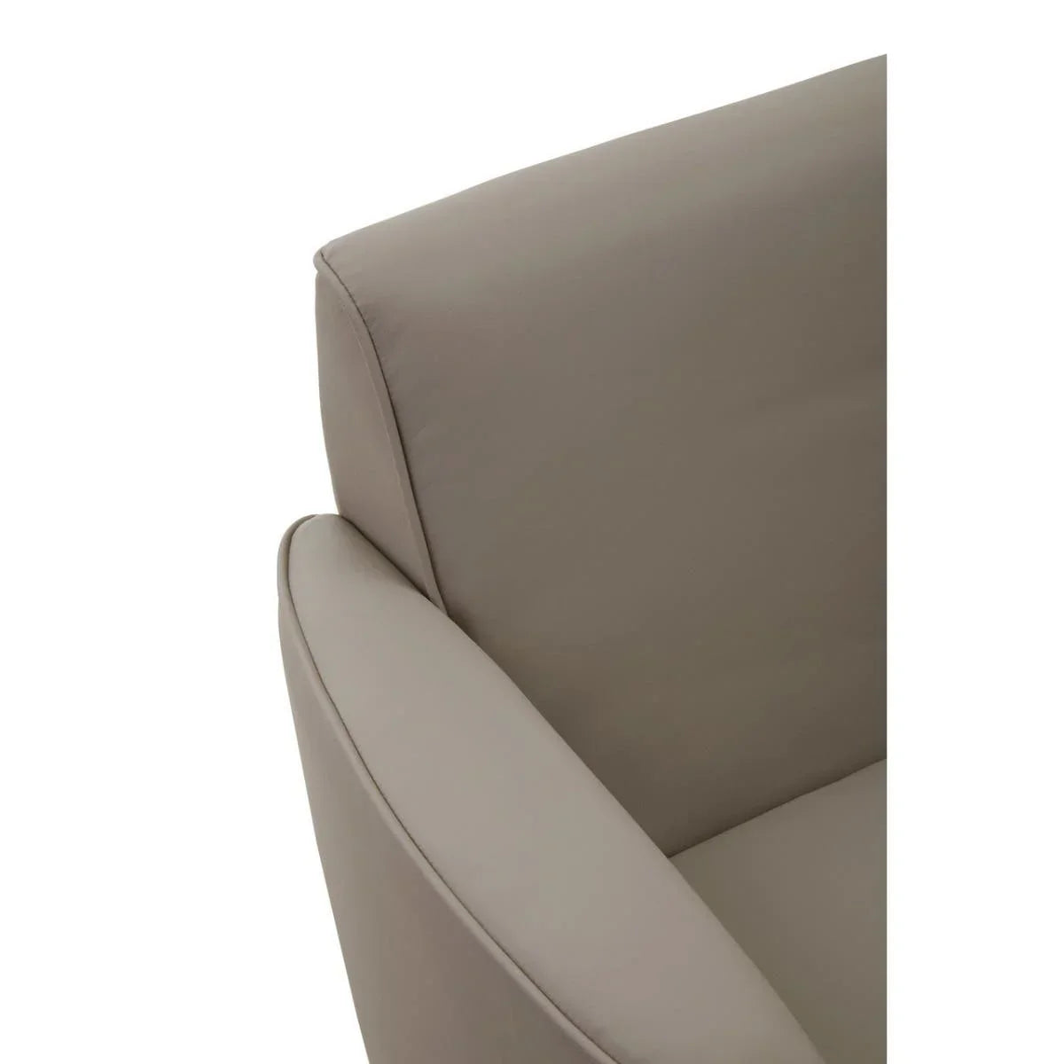 Closeup of beige leather sofa arm and backrest detailing