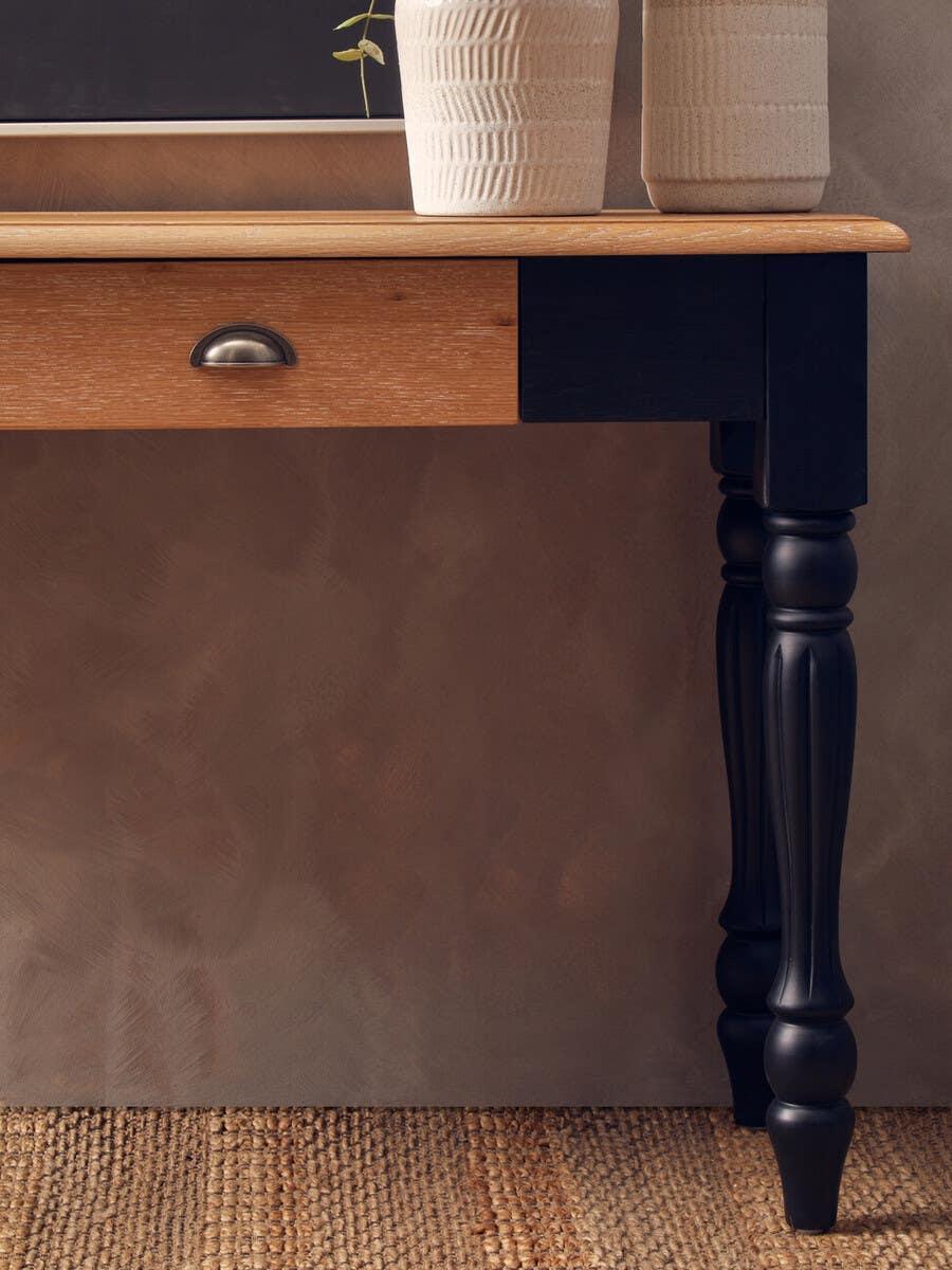 Oak console table with black turned leg and ceramic vases on top