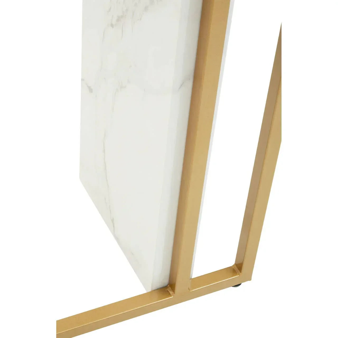 Close-up of marble coffee table top with gold metal frame detail