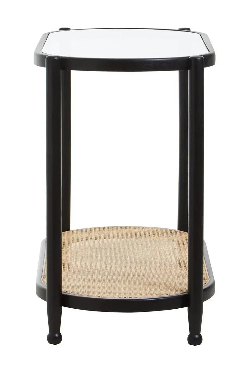 Black side table with glass top and woven rattan shelf, front view