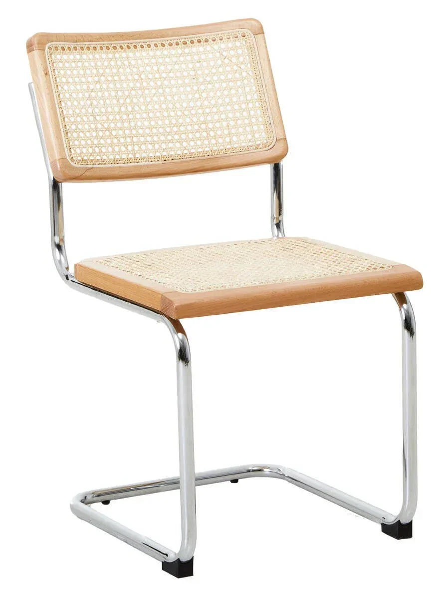 Cane dining chair with chrome cantilever frame and light wood accents, front angle view
