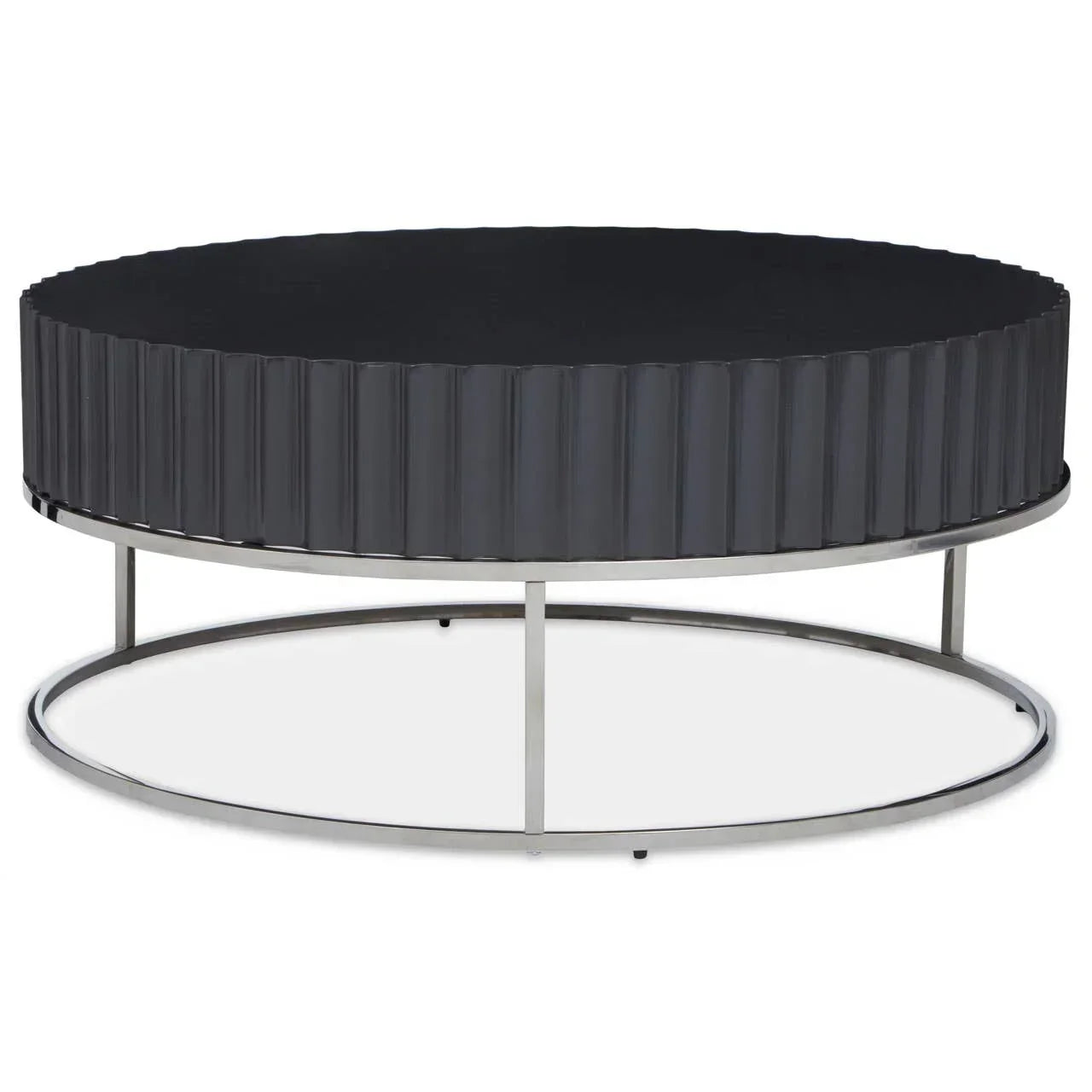 Round black coffee table with ribbed sides and chrome metal frame on white background