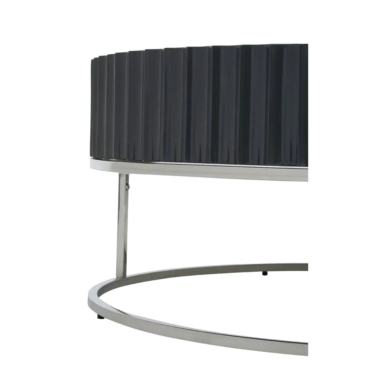 Modern black sideboard with ribbed panels and chrome metal base close-up