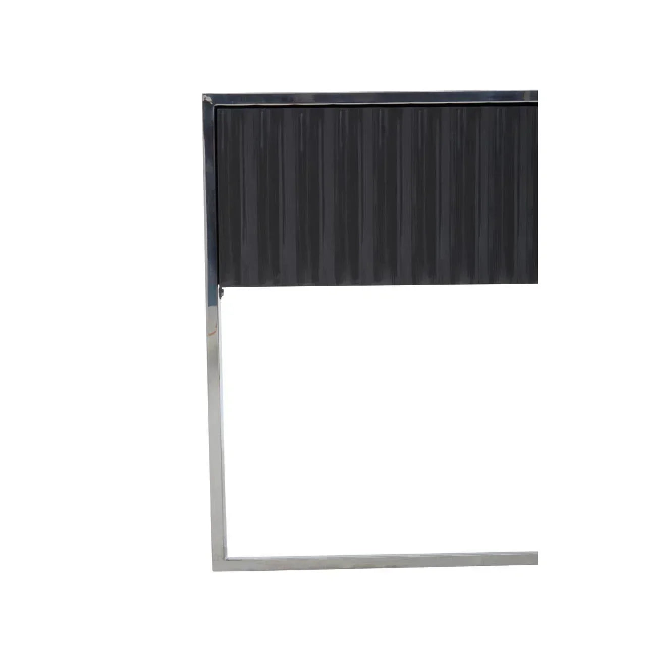 Black panel dining table with chrome metal legs, close-up side view