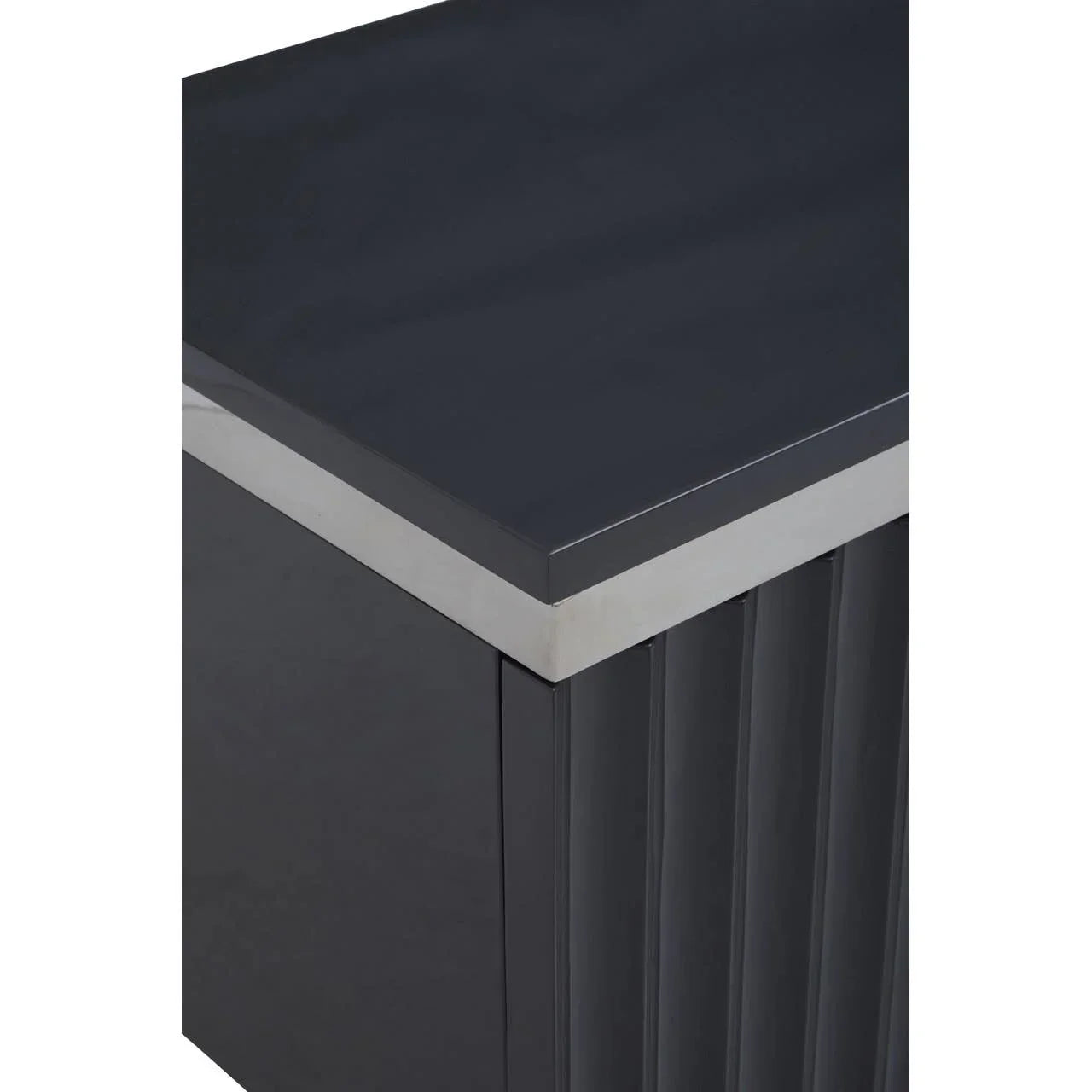 Gloss black cabinet corner with chrome trim and vertical fluted panel detailing