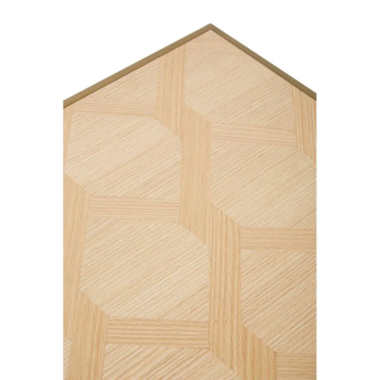 Light wood furniture panel with geometric parquet pattern and angled brass trim detail