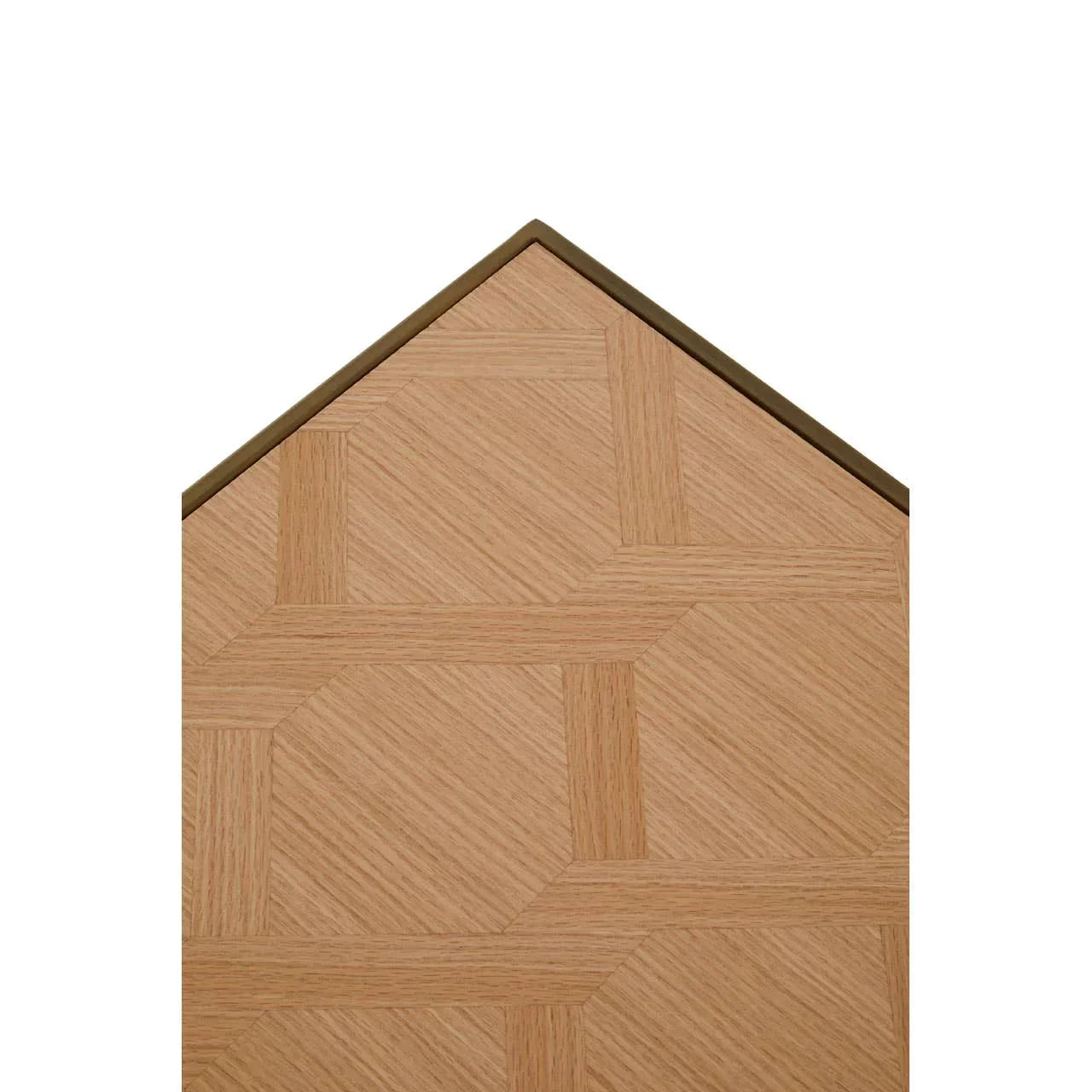 Close-up of wooden dining table top with geometric inlay pattern and angled edge