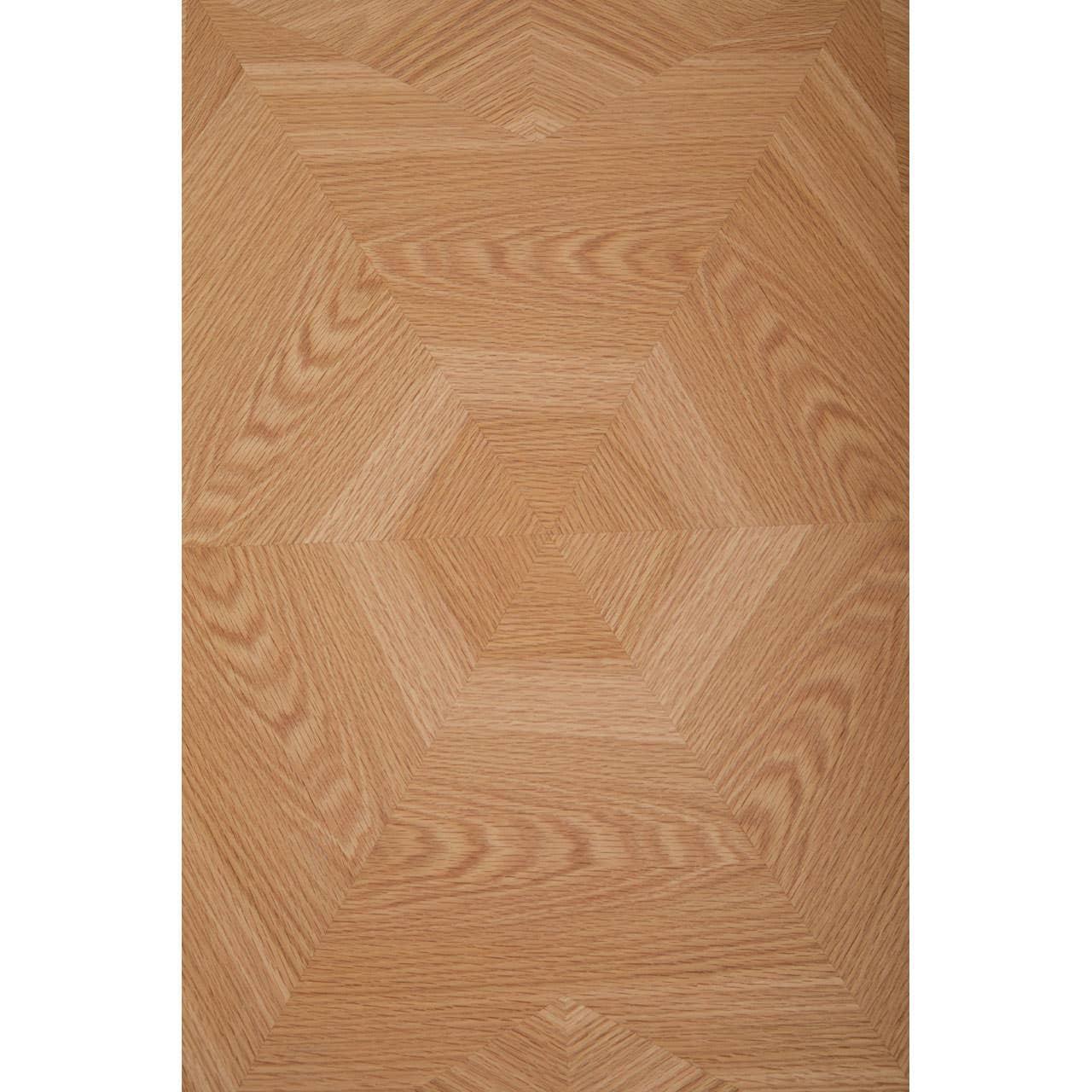 Light oak dining table top with geometric wood grain pattern viewed from above