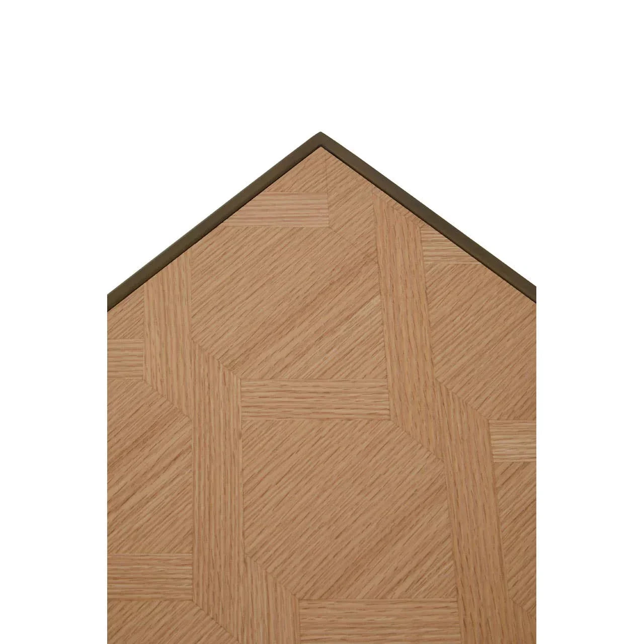 Light oak wood dining table corner with geometric pattern and dark trim detail