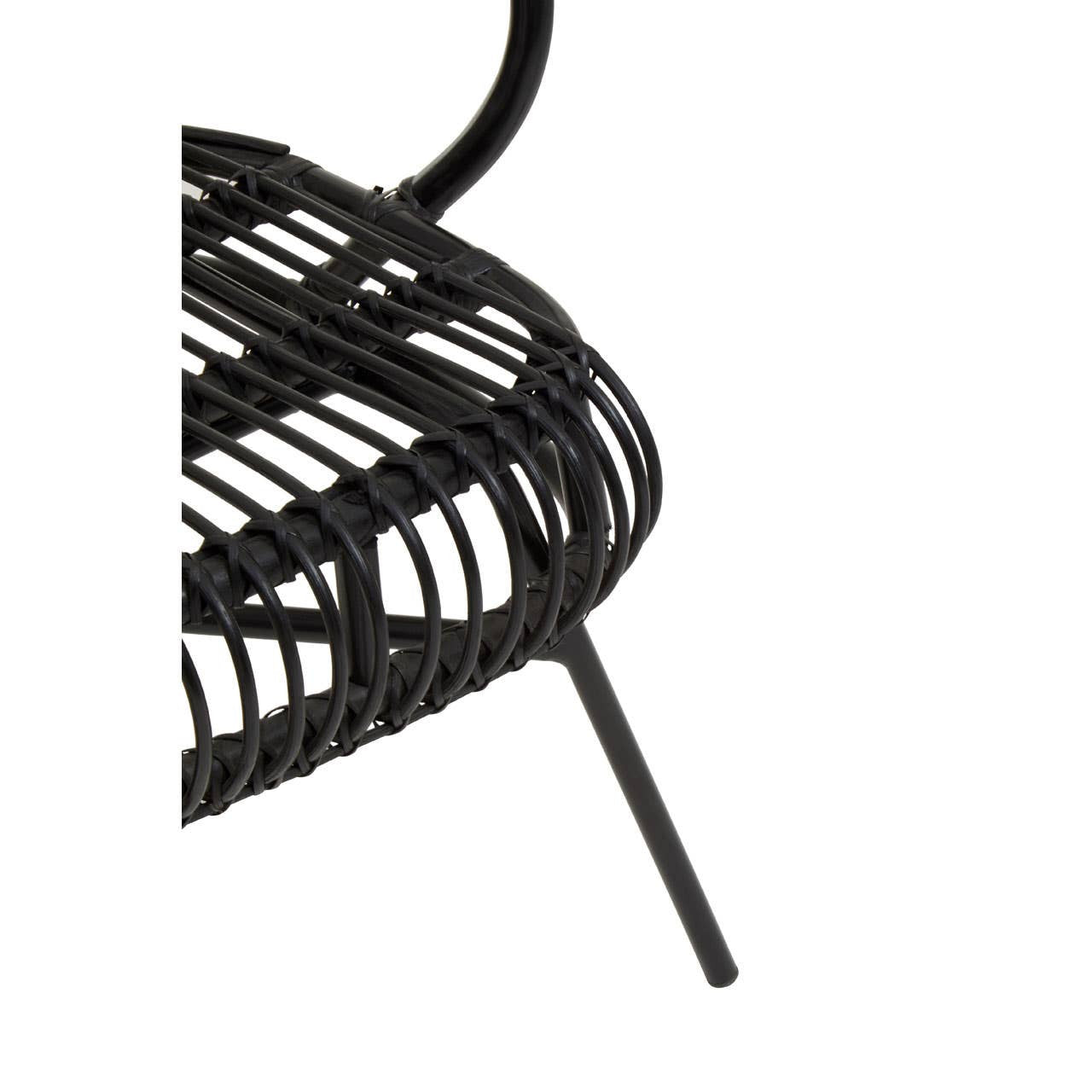A close-up view of the Java Black Natural Rattan and Black Metal Scalloped Back Chair, showcasing the intricate rattan weaving and the sleek black metal frame. The scalloped back design is visible, highlighting the chair's modern aesthetic. One of the chair's legs is partially visible, emphasizing its sturdy construction