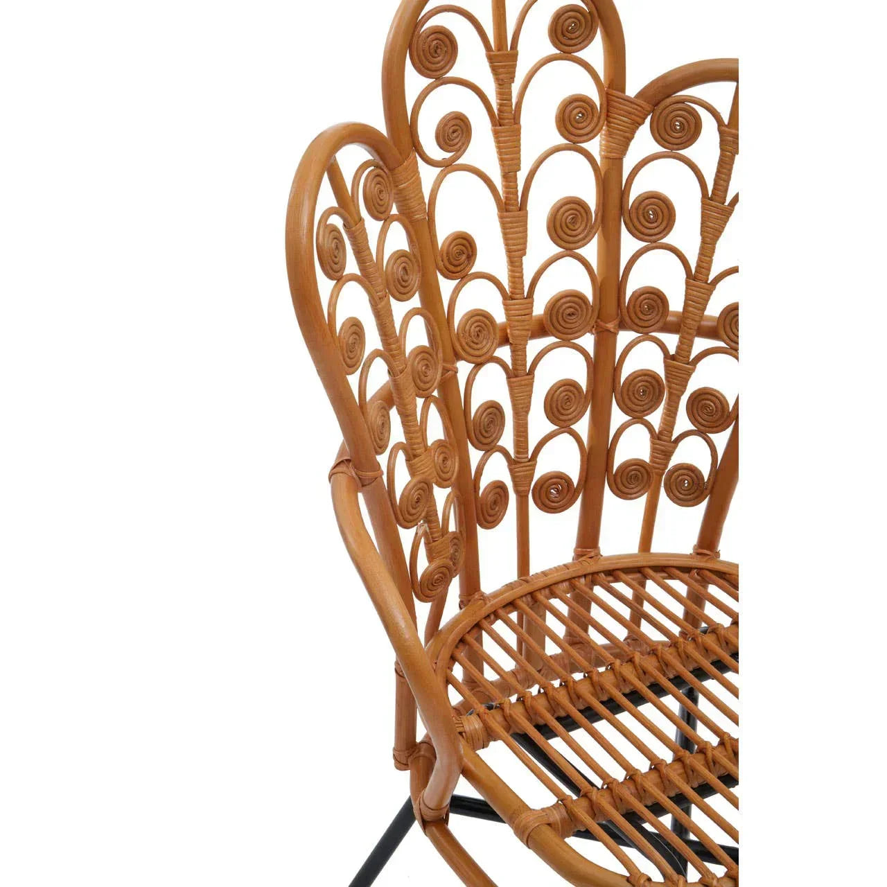 Curved rattan chair with intricate scroll backrest and open weave seat design
