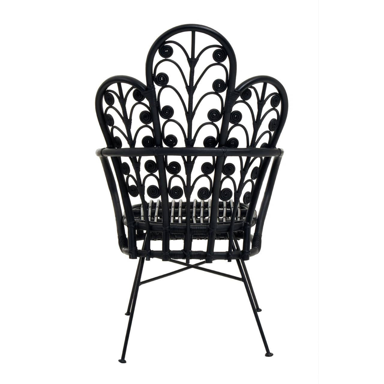 Black rattan chair with a scalloped back design featuring a leaf pattern, supported by slender metal legs. The chair has a natural finish and a stylish, contemporary look suitable for home decor