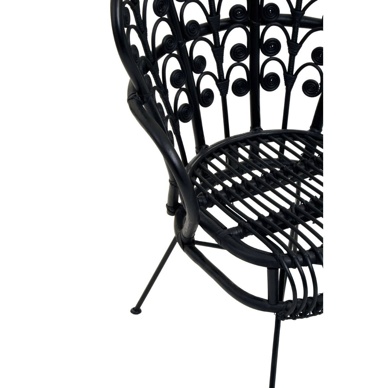 Black rattan chair with a scalloped back design, featuring intricate patterns and a sturdy base. The chair's legs are slender and angled, providing a modern aesthetic suitable for home decor
