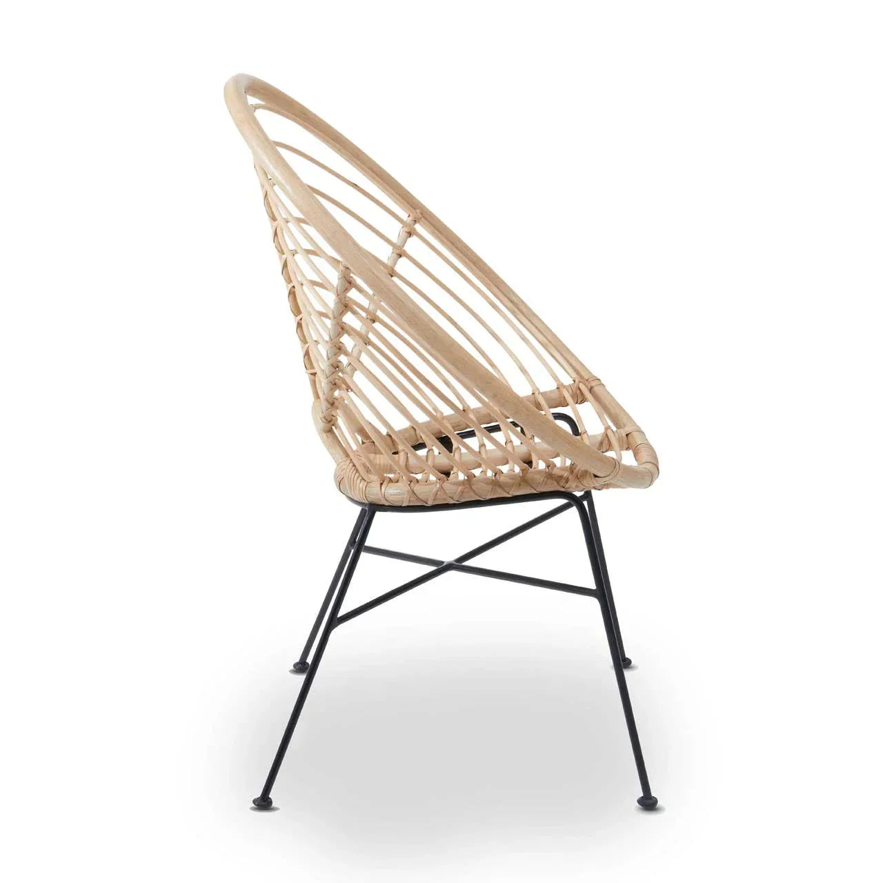 Side view of rattan accent chair with black metal legs and open weave design