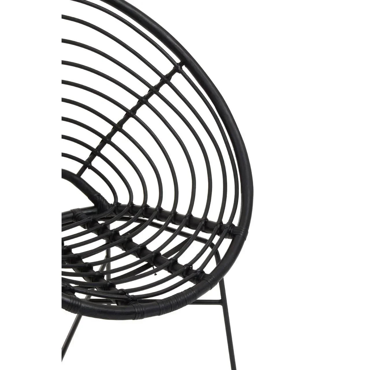 Black rattan chair seat with open circular weave and metal legs, close-up view