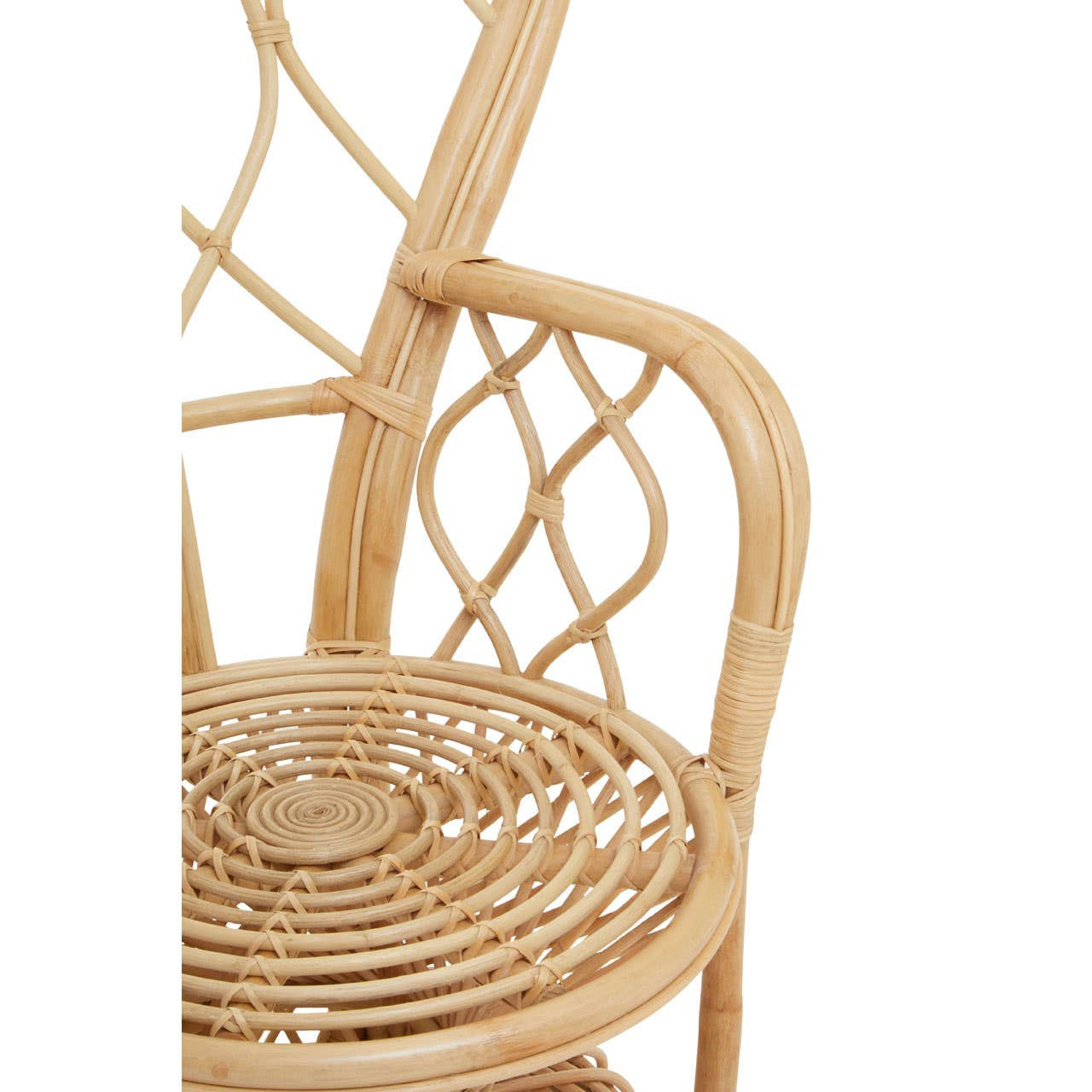 Curved chair made from natural rattan featuring a woven seat and backrest with a decorative lattice design, showcasing a light, airy aesthetic suitable for home decor