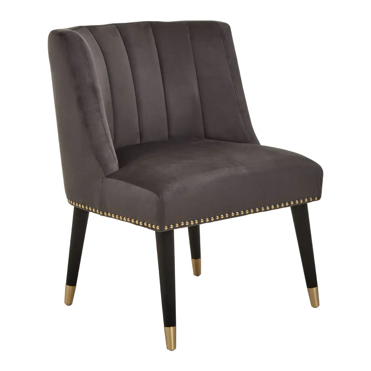 Grey velvet accent chair with vertical channeled back, gold stud trim, and tapered black legs