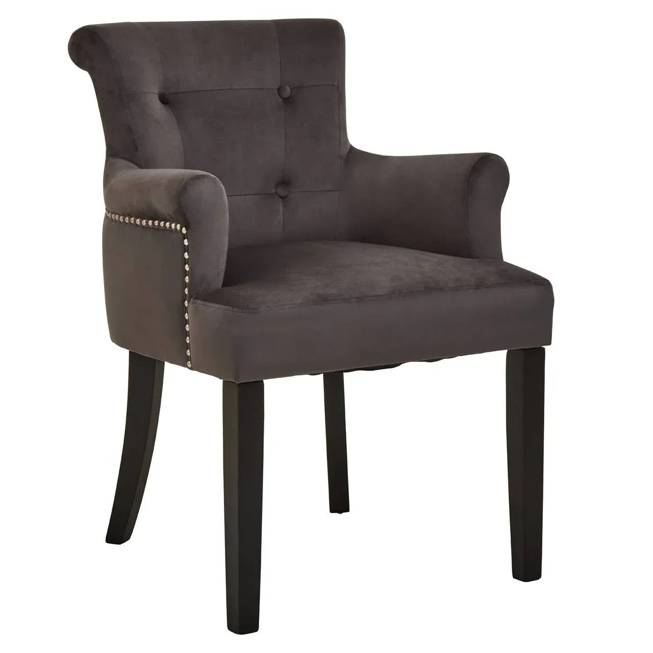 Dark grey upholstered armchair with button tufted back and studded trim, black wooden legs