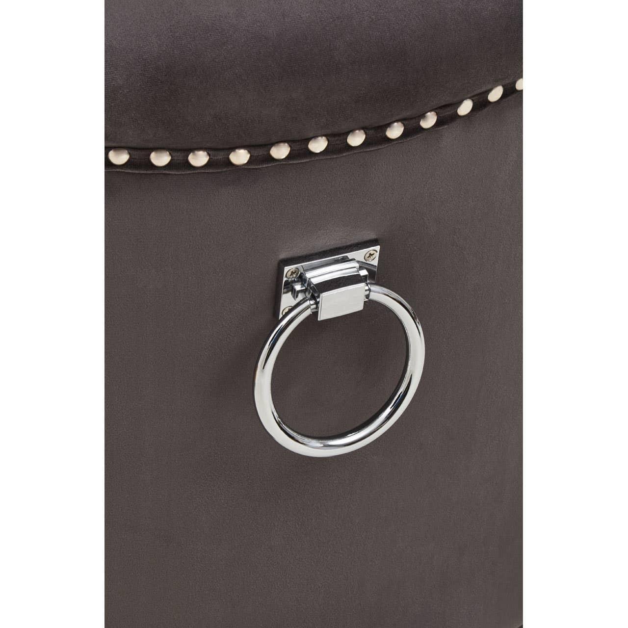 Grey velvet ottoman with chrome ring handle and studded trim detail
