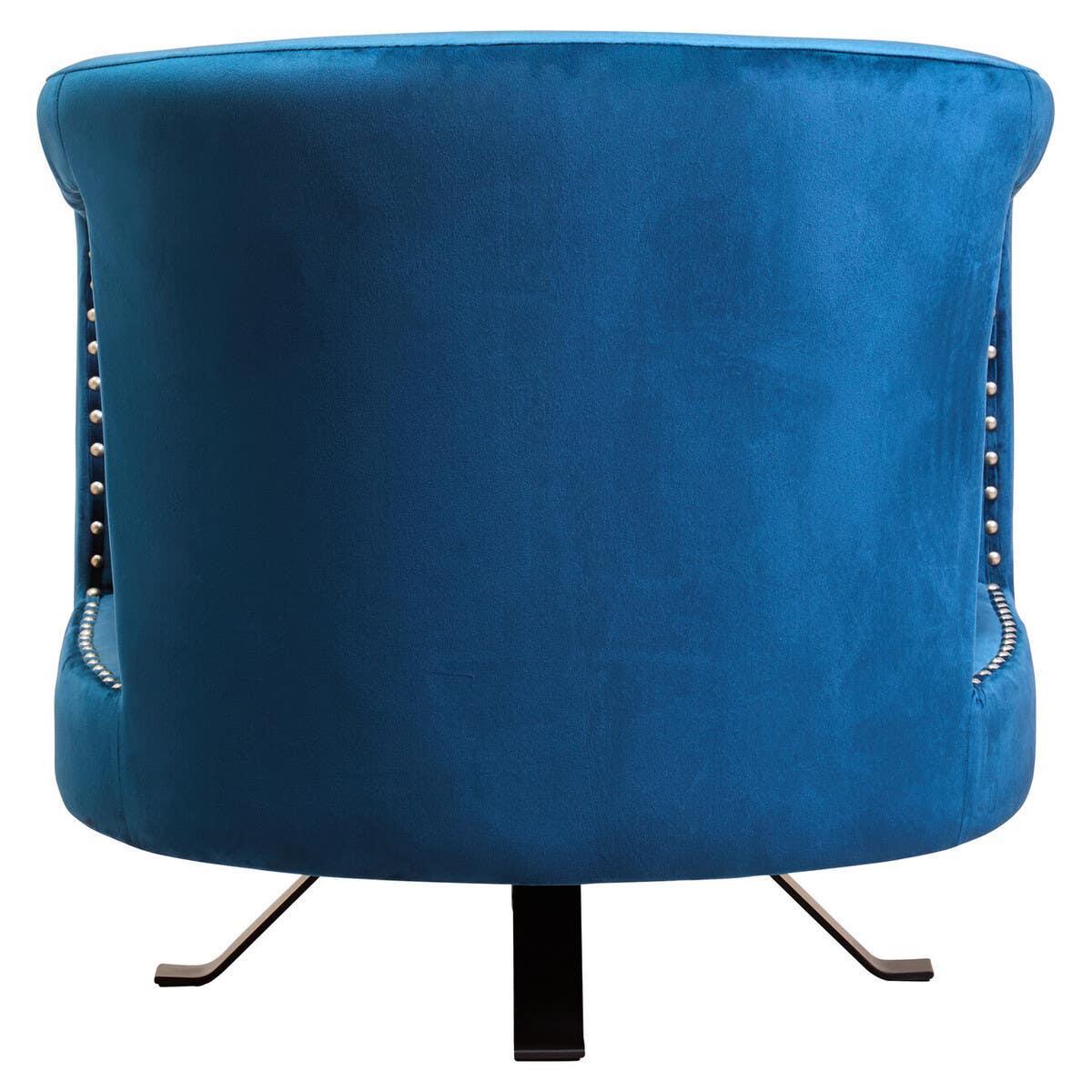 Back view of blue velvet accent chair with metal legs and silver stud trim
