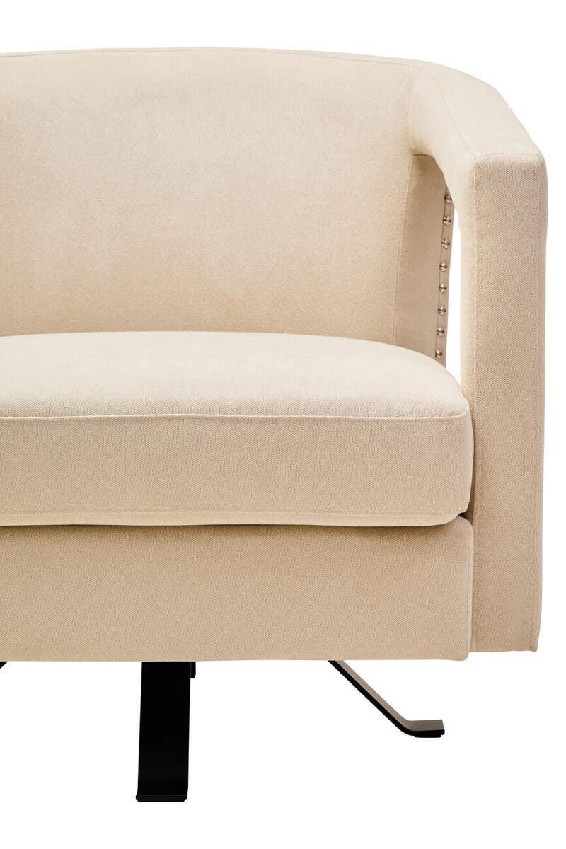 Beige fabric swivel armchair with metal base and nailhead trim detail on side