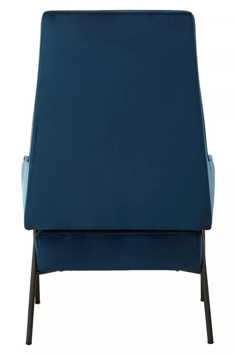 Rear view of blue velvet accent chair with black metal legs