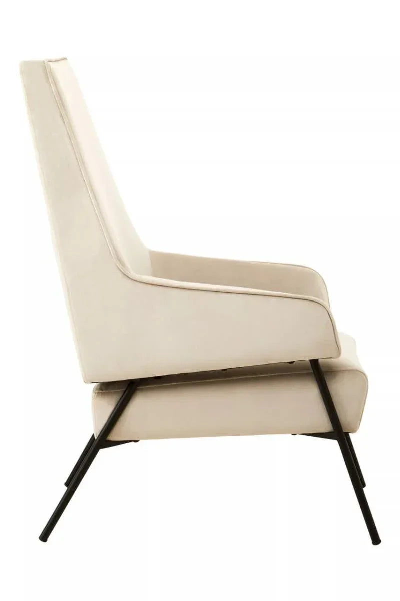 Beige accent chair with slim black metal legs, side view showing cushioned seat and back