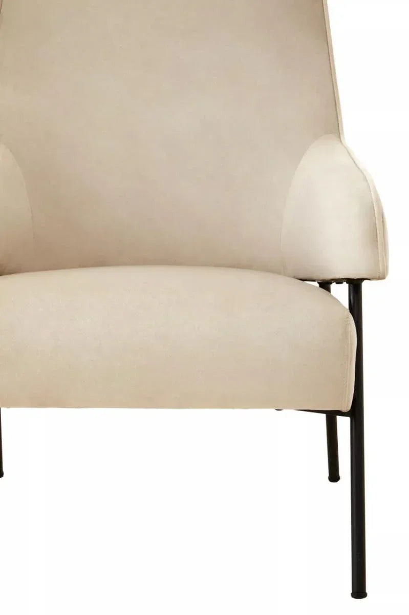 Cream upholstered armchair with black metal legs, front angle view