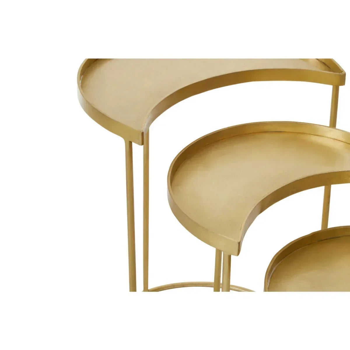 Set of gold metal nesting tables with crescent shaped tops and slim legs, top view