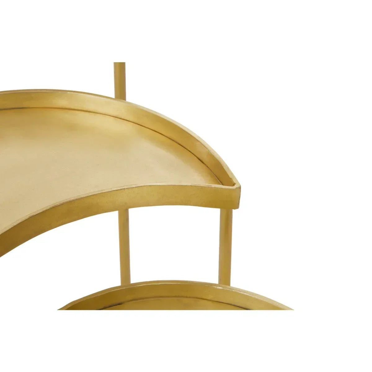 Gold metal shelving unit closeup showing curved corner and smooth finish